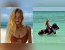 Marina Ruy Barbosa chama a atenção ao andar a cavalo no mar