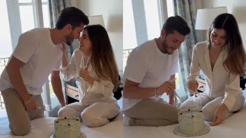 Os famosos aparecem em um quarto com um bolo branco