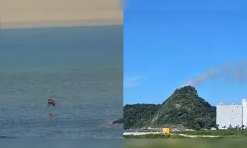 Helicóptero capta água do mar para combater incêndio que dura mais de 24h no litoral do Paraná