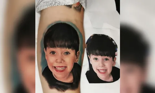 Homenagem: pai de Henry faz tatuagem do menino no braço