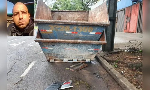 Motociclista é internado na UTI após colidir contra caçambas