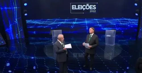 Lula e Bolsonaro durante debate na Band