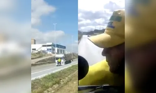 Bolsonarista se pendura em caminhão para impedir passagem; vídeo