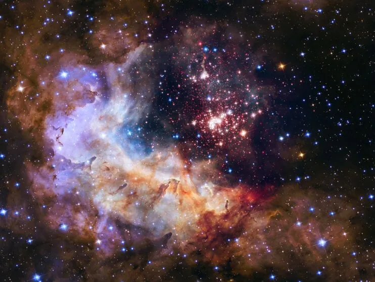 Foto de um aglomerado gigante de estrelas chamado Westerlund 2; o conjunto reside dentro de berçário estelar conhecido como Gum 29, localizado a 20 mil anos-luz de distância na constelação de Carina; o registro é de 25 de novembro de 2014