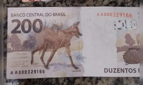 Cliente dá golpe em farmácia e paga compra com nota falsa de R$ 200