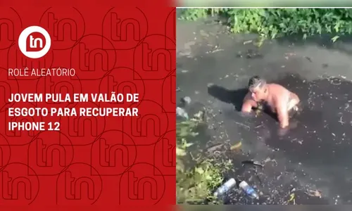 Jovem pula em valão de esgoto para recuperar iPhone