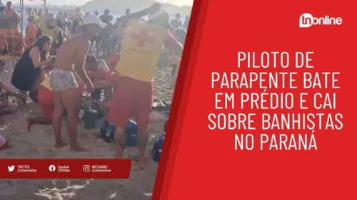 Piloto de parapente bate em prédio e cai sobre banhistas no Paraná