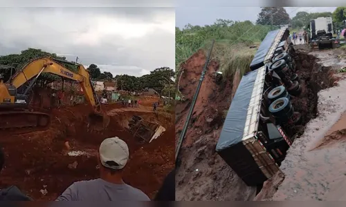 Carreta 'engolida' por cratera é retirada com retroescavadeira; vídeo