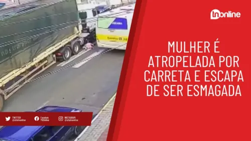 Mulher é atropelada por carreta e escapa de ser esmagada