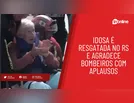 Idosa é resgatada no RS e agradece bombeiros com aplausos