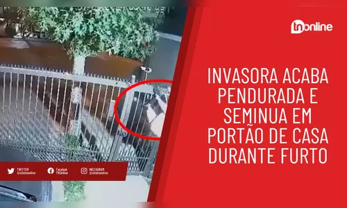 Em apuros! Mulher tenta pular portão e acaba perdendo as calças