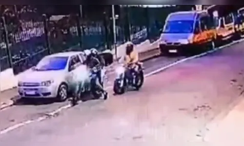Câmera flagra motorista sendo executado a tiros em frente escola; veja