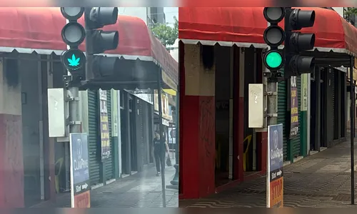 Fim do mistério: semáforo com imagem de maconha era adesivo