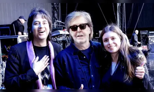O casal conseguiu chamar a atenção do ex-Beatle, que o chamou para se juntar a ele no palco.