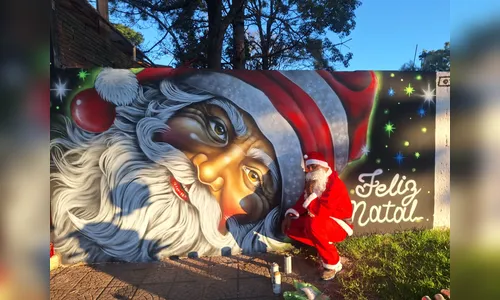 Grafiteiro presenteia Cambira com arte natalina e encanta população
