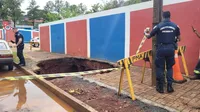 Chuva forte danifica asfalto e derruba muro de escola em Apucarana