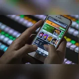 Ex-gerente de banco é presa por desviar mais de R$ 2 mi e usar no 'jogo do tigrinho'