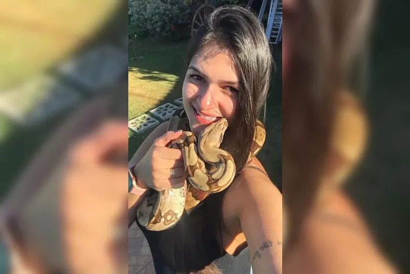  A maringaense Paola Maciel tem uma jiboia de dois metros como animal de estimação. 