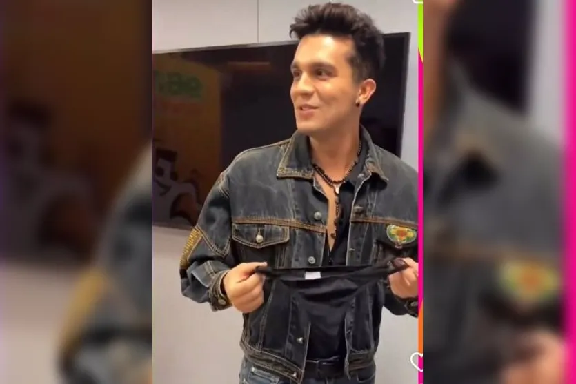 Luan Santana recebe calcinha de fã, cheira e reage; assista ao vídeo