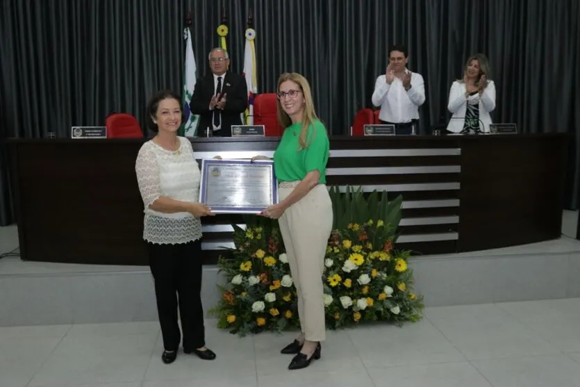  Homenageada e ex-vereador Márcia Sousa, autora da proposição 