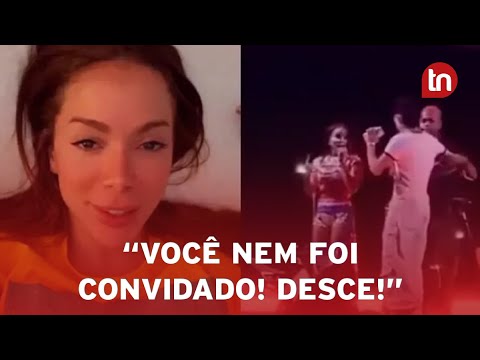 Anitta se irrita com fã que invadiu palco em show