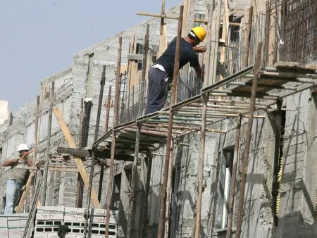  Pedreiros palestinos trabalham na construção de casas israelenses 