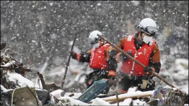  Neve está dificultando os trabalhos de resgate em Minamisanriku