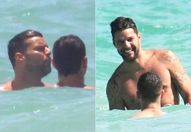 Ricky Martin curte praia com o namorado