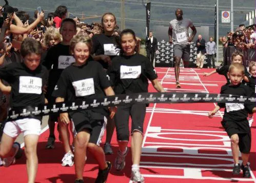  Usain Bolt durante corrida de caridade na Suíça