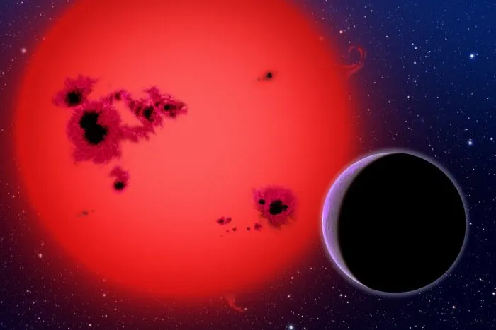  Concepção artística mostra o planeta GJ 1214b (em preto) fazendo a órbita em torno da estrela