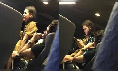 Bruna Marquezine é fotografada sentada no colo de rapaz