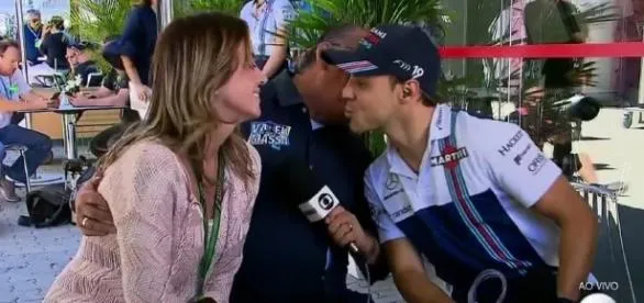 Em uma cena 'inusitada', narrador Galvão Bueno 'invade' beijo de Felipe Massa e esposa