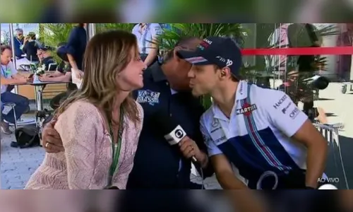 Galvão Bueno 'disputa' beijo de Felipe Massa com a esposa 