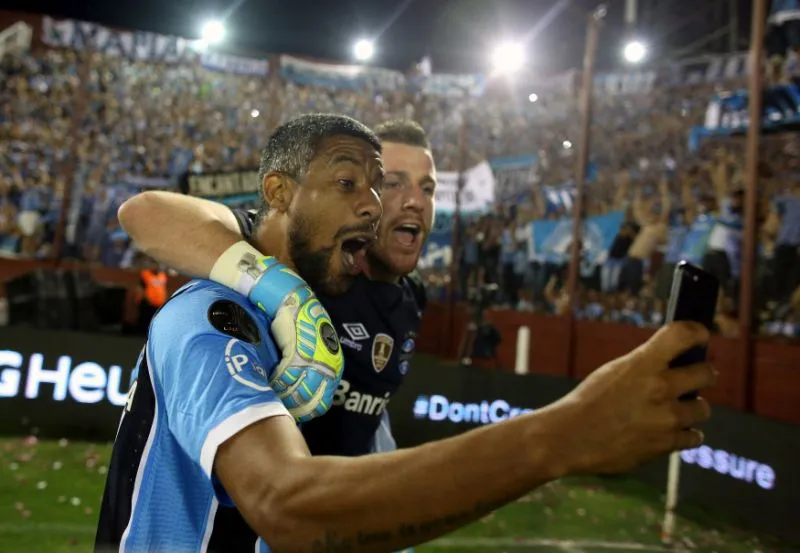 Jogadores do Grêmio comemoram o título da Libertadores - Foto:AP