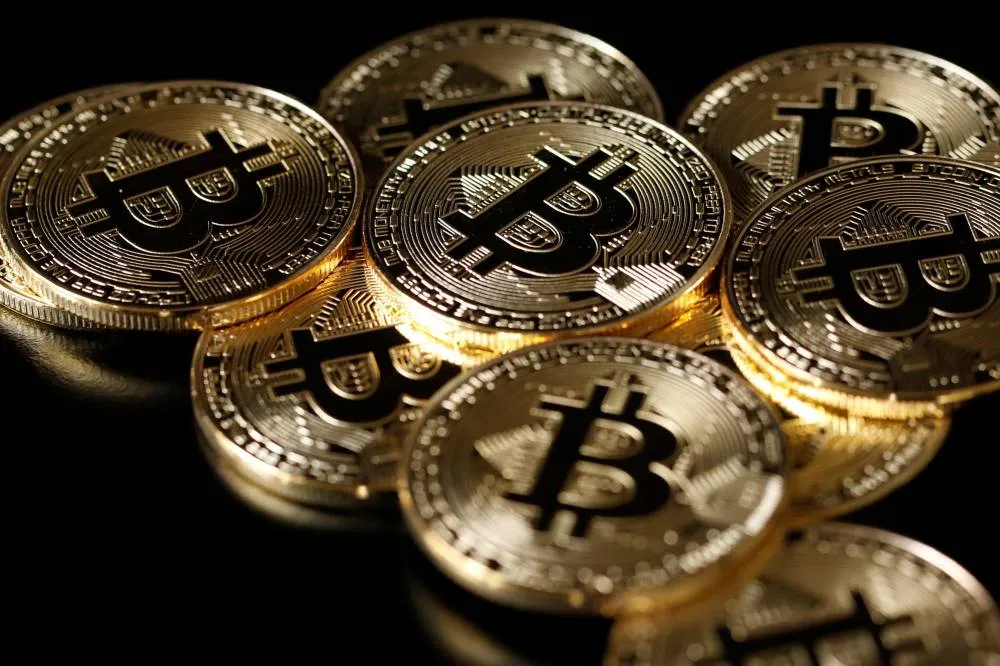 TSE proibiu uso de moedas virtuais, como o Bitcoin, na eleição de 2018 Foto: Benoit Tessier/Illustration/Reuters