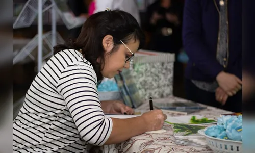 Biblioteca sedia Lançamento de Livro e Exposição de Desenhos