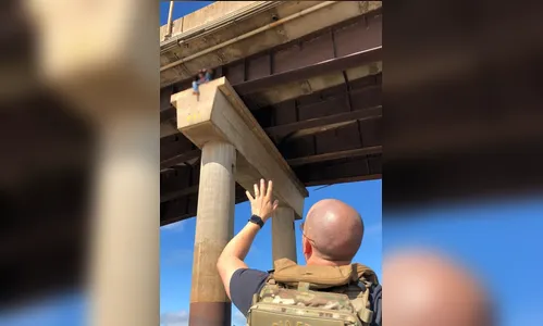 Policiais resgatam contrabandista foragido em pilar na Ponte Ayrton Senna