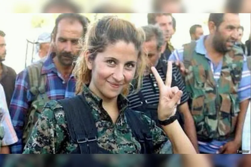  Pouco se sabe sobre a guerrilheira "Rehana", a começar por seu nome. Tampouco há evidências de que ela esteja na linha de frente - Fonte da imagem: BBC Brasil  