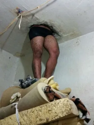 Preso fica enroscado no teto de delegacia (Foto: Divulgação / Polícia Civil )