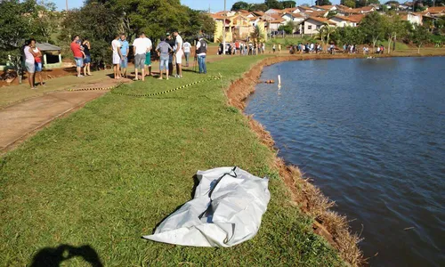 Bombeiros retiram corpo de menor travesti desovado em lago